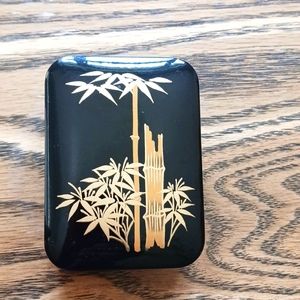 Vintage Black and Gold Plastic Trinket Box with Bamboo Design.